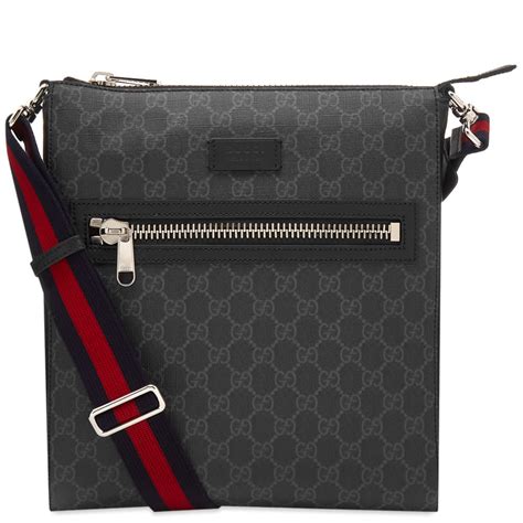 gucci men's gg supreme leather-trimmed messenger bag - black